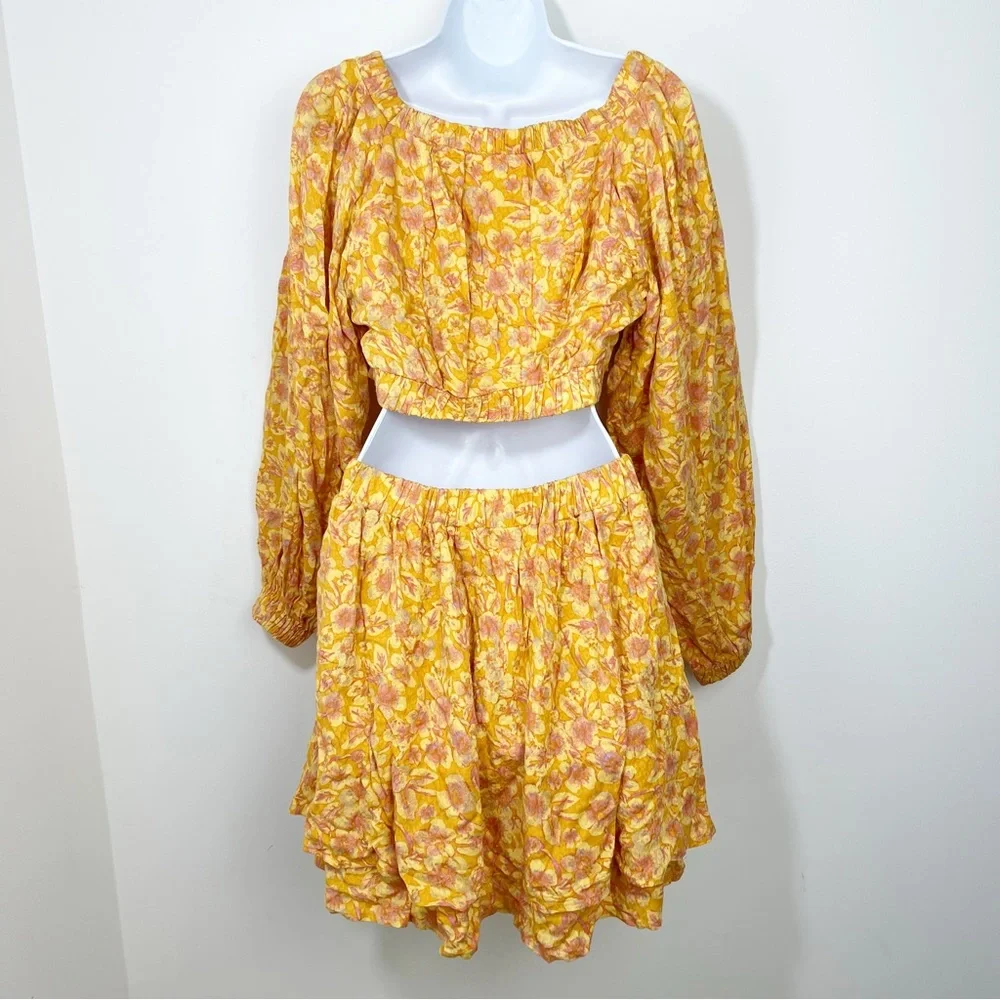 Free People Jael Printed Mini Dress Size  Medium Cut Out sides Yellow Floral